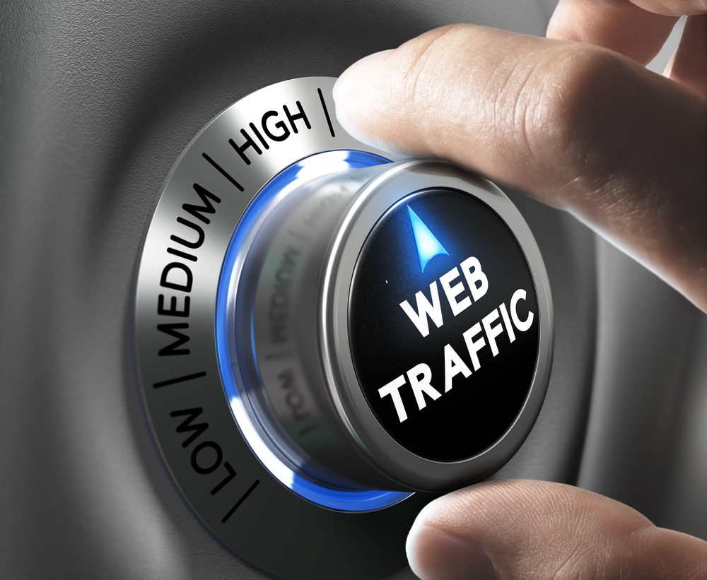 Web traffic button pointing high position with two fingers, blue and grey tones, Conceptual image for internet seo.